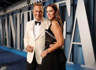 BEVERLY HILLS, CALIFORNIA - MARCH 27: (L-R) Kevin Costner and Christine Baumgartner attend the 2022 Vanity Fair Oscar Party hosted by Radhika Jones at Wallis Annenberg Center for the Performing Arts on March 27, 2022 in Beverly Hills, California. (Photo by Rich Fury/VF22/Getty Images for Vanity Fair)