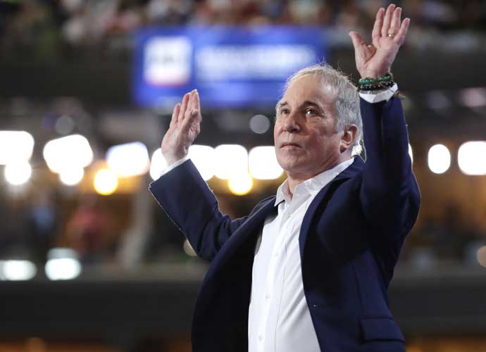 PHILADELPHIA, PA - JULY 25: Singer-songwriter Paul Simon performs on stage during the first day of the Democratic National Convention at the Wells Fargo Center, July 25, 2016 in Philadelphia, Pennsylvania. An estimated 50,000 people are expected in Philadelphia, including hundreds of protesters and members of the media. The four-day Democratic National Convention kicked off July 25. (Photo by Chip Somodevilla/Getty Images)