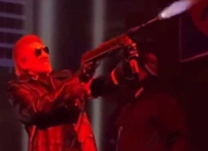 Roger Waters fires fake gun at Berlin concert (Image: Twitter)