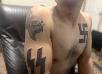Texas shooter Mauricio Garcia shows off swastika tattoos (Image: Ok.ru)