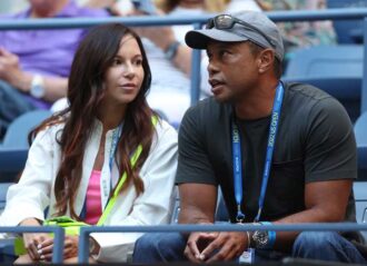 NEW YORK, NEW YORK - AUGUST 31: Erica Herman and Tiger Woods look on prior to the Women's Singles Second Round match between Anett Kontaveit of Estonia and Serena Williams of the United States on Day Three of the 2022 US Open at USTA Billie Jean King National Tennis Center on August 31, 2022 in the Flushing neighborhood of the Queens borough of New York City. (Photo by Matthew Stockman/Getty Images)