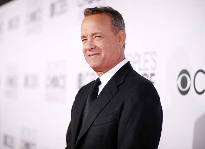 Tom Hanks Jabs At Ron DeSantis & ‘Booking Banning’ In Harvard 2023 Commencement Address