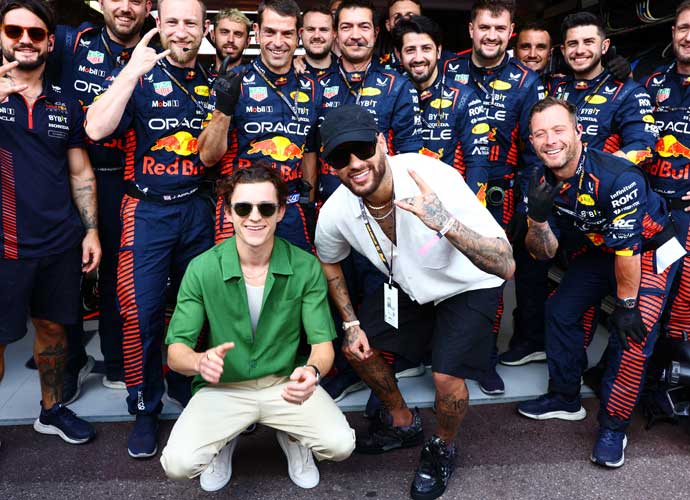 MONTE-CARLO, MONACO - MAY 28: Tom Holland and Neymar pose for a photo with the Red Bull Racing team prior to the F1 Grand Prix of Monaco at Circuit de Monaco on May 28, 2023 in Monte-Carlo, Monaco. (Photo by Mark Thompson/Getty Images)