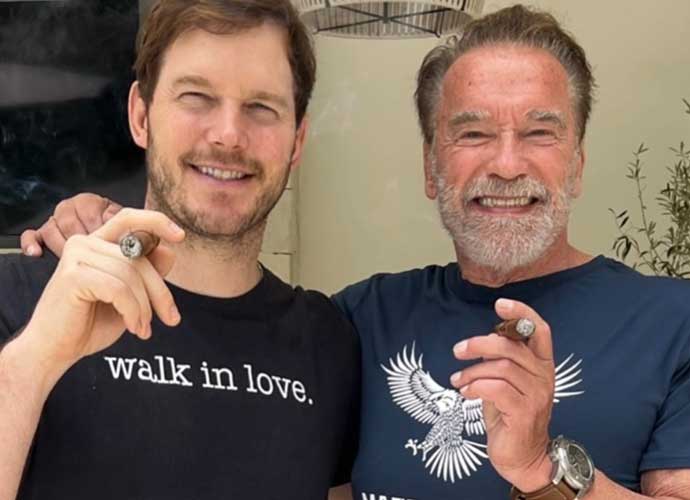 Arnold Schwarzenegger & son-in-law Chris Pratt smoke cigars together (Image: Instagram)