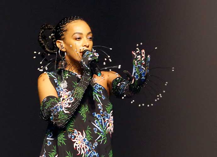 PARIS, FRANCE - JUNE 23: US singer Solange Knowles performs during the runway during the Kenzo Menswear Spring Summer 2020 show as part of Paris Fashion Week on June 23, 2019 in Paris, France. (Photo by Thierry Chesnot/Getty Images)
