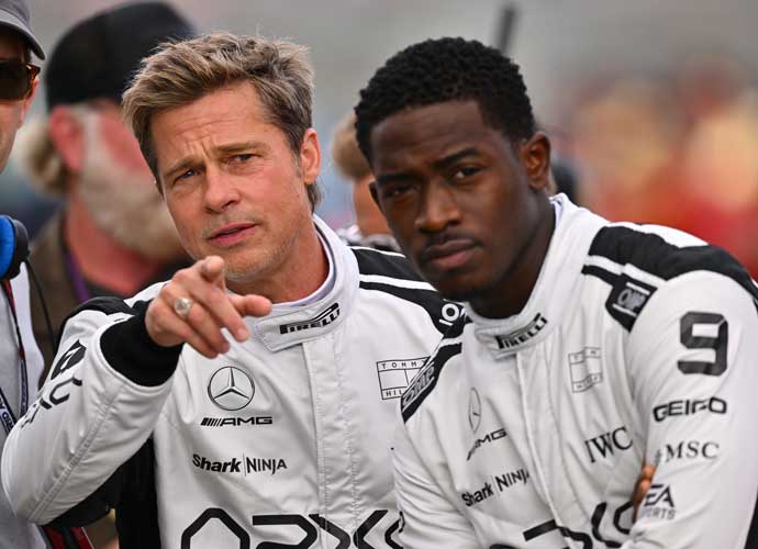 NORTHAMPTON, ENGLAND - JULY 09: Brad Pitt, star of the upcoming Formula One based movie, Apex, and Damson Idris, co-star of the upcoming Formula One based movie, Apex, look on from the grid during the F1 Grand Prix of Great Britain at Silverstone Circuit on July 09, 2023 in Northampton, England. (Photo by Dan Mullan/Getty Images)