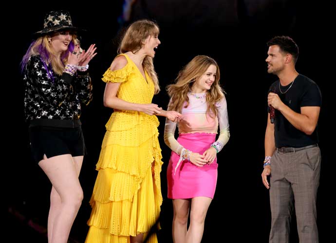 KANSAS CITY, MISSOURI - JULY 07 (L-R) Presley Cash, Taylor Swift, Joey King and Taylor Lautner speak onstage for night one of Taylor Swift | The Eras Tour at GEHA Field at Arrowhead Stadium on July 07, 2023 in Kansas City, Missouri. (Photo by John Shearer/TAS23/Getty Images for TAS Rights Management)