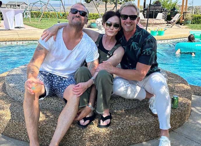 Shannen Doherty, Brian Austin Green & Ian Ziering poses together on Green's 50th birthday (Image: Instagram)