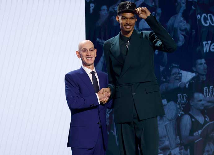 NEW YORK, NEW YORK - JUNE 22: Victor Wembanyama (R) poses with NBA commissioner Adam Silver (L) after being drafted first overall pick by the San Antonio Spurs during the first round of the 2023 NBA Draft at Barclays Center on June 22, 2023 in the Brooklyn borough of New York City. (Photo by Sarah Stier/Getty Images)