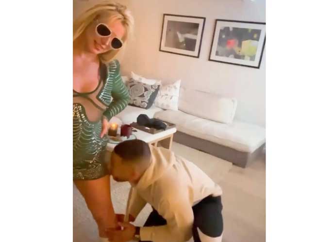 Britney Spears posts photo of man licking her leg on social media (Image: Instagram)