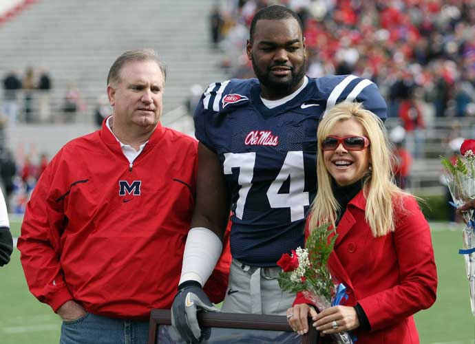 OXFORD, MS - NOVEMBER 28: Michael Oher #74 of the Ole Miss Rebels stands with his family during senior ceremonies prior to a game against the Mississippi State Bulldogs at Vaught-Hemingway Stadium on November 28, 2008 in Oxford, Mississippi. (Photo by Matthew Sharpe/Getty Images)