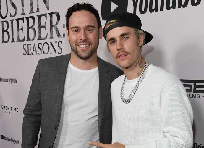 WESTWOOD, CALIFORNIA - JANUARY 27: Scooter Braun and Justin Bieber attend YouTube Originals 