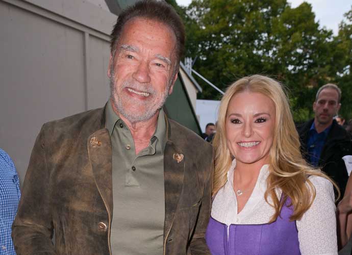 MUNICH, GERMANY - SEPTEMBER 23: Arnold Schwarzenegger and Heather Milligan attend the 188th Oktoberfest at Marstall tent on September 23, 2023 in Munich, Germany. (Photo by Hannes Magerstaedt/Getty Images)