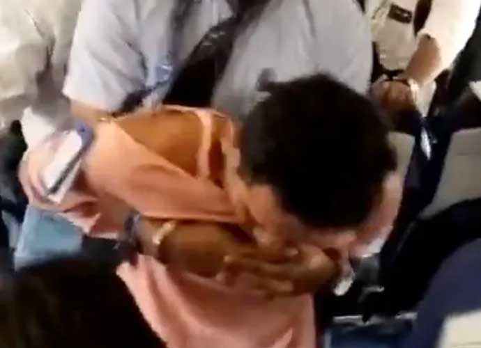 Biswajit Debnath restrained on Indigo flight (Image: Twitter/X)