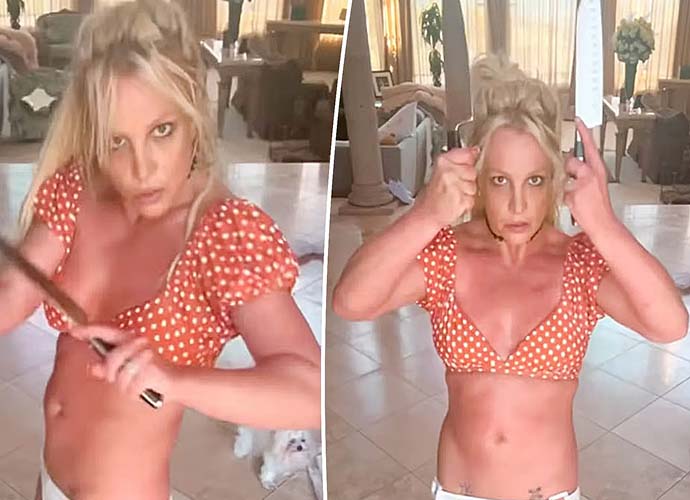 Britney Spears plays with knives in new videos (Image: Instagram)