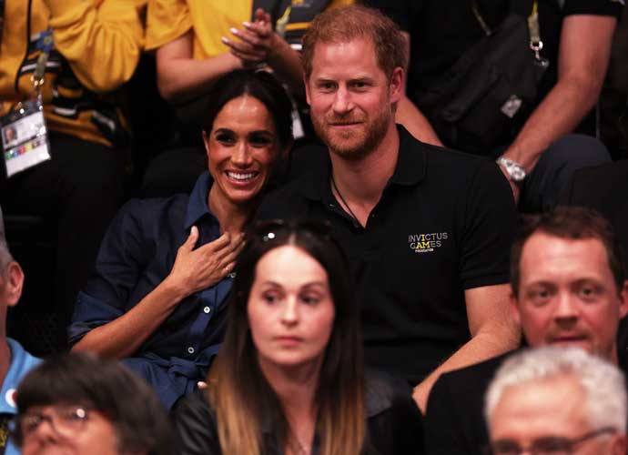 DUESSELDORF, GERMANY - SEPTEMBER 15: Meghan, Duchess of Sussex and Prince Harry, Duke of Sussex watch on during the Mixed Team Gold Medal match between Team Colombia and Team Poland during day six of the Invictus Games Düsseldorf 2023 on September 15, 2023 in Duesseldorf, Germany. (Photo by Dean Mouhtaropoulos/Getty Images for Invictus Games Düsseldorf 2023)