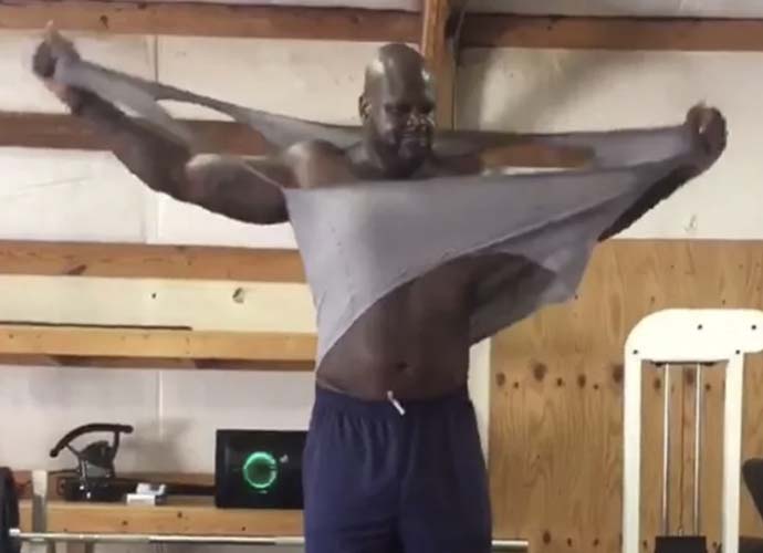 Shaquille O'Neal rips off his shirt (Image: Instagram)