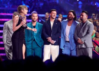 NEWARK, NEW JERSEY - SEPTEMBER 12: (L-R) Taylor Swift accepts the Best Pop award for "Anti-Hero" from Joey Fatone, Lance Bass, Justin Timberlake, JC Chasez, and Chris Kirkpatrick of *NSYNC onstage the 2023 MTV Video Music Awards at Prudential Center on September 12, 2023 in Newark, New Jersey. (Photo by Theo Wargo/Getty Images for MTV)