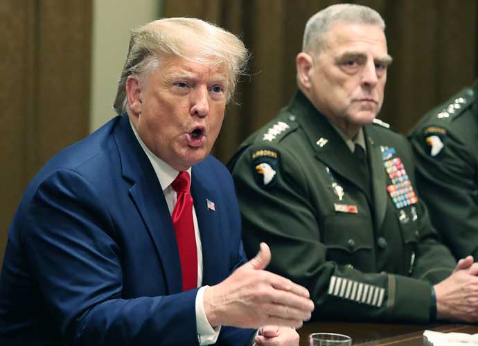 WASHINGTON, DC - OCTOBER 07: U.S. President Donald Trump speaks as Joint Chiefs of Staff Chairman, Army General Mark Milley looks on after a briefing from senior military leaders in the Cabinet Room at the White House on October 7, 2019 in Washington, DC. Trump spoke about the pull-out of U.S troops in northeastern Syria and the impeachment inquiry in the House of Representatives. (Photo by Mark Wilson/Getty Images)
