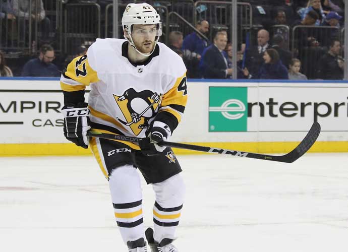 NEW YORK, NEW YORK - MARCH 25: Adam Johnson #47 of the Pittsburgh Penguins skates against the New York Rangers at Madison Square Garden on March 25, 2019 in New York City. The Penguins defeated the Rangers 5-2. (Photo by Bruce Bennett/Getty Images)