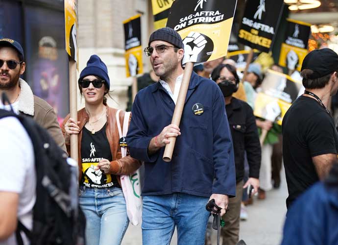 NEW YORK, NEW YORK - OCTOBER 25: Lizzy Caplan and Zachary Quinto join SAG-AFTRA members on strike on October 25, 2023 in New York City. The strike, which began on July 14, entered its 100th day on October 21st as the actors' union and Hollywood studios and streamers failed to reach an agreement. (Photo by John Nacion/Getty Images)