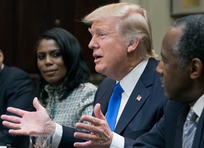 WASHINGTON, DC - FEBRUARY 1: (AFP OUT) President Donald Trump holds an African American History Month listening session attended by nominee to lead the Department of Housing and Urban Development (HUD) Ben Carson (R), Director of Communications for the Office of Public Liaison Omarosa Manigault (L) and other officials in the Roosevelt Room of the White House on February 1, 2017 in Washington, DC. (Photo by Michael Reynolds - Pool/Getty Images)