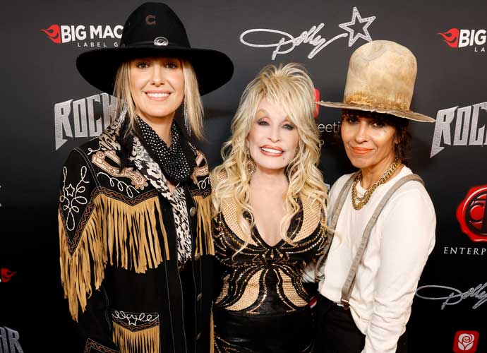 NASHVILLE, TENNESSEE - NOVEMBER 16: (EDITORS NOTE: This image has been retouched.) (L-R) Lainey Wilson, Dolly Parton and Linda Perry attend Dolly Parton's Rockstar VIP Album Release Party with American Greetings on November 16, 2023 in Nashville, Tennessee. (Photo by Jason Kempin/Getty Images for American Greetings)