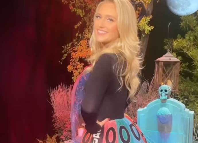 Maggie Sajak dresses as a Wheel of Fortune to honor dad on Halloween (Image: Maggie Sajak/Instagram)