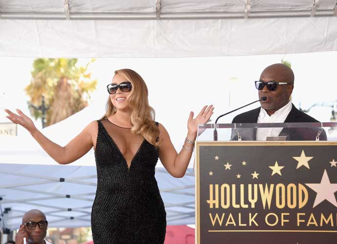 HOLLYWOOD, CA - AUGUST 05: Singer Mariah Carey (L), with Chairman and CEO, Epic Records, L.A. Reid, is honored with Star on The Hollywood Walk of Fame on August 5, 2015 in Hollywood, California. (Photo by Kevin Winter/Getty Images)