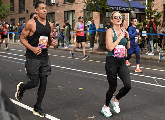 NEW YORK, NEW YORK - NOVEMBER 05: TJ Holmes and Amy Robach run during the 2023 TCS New York City Marathon on November 05, 2023 in New York City. (Photo by Noam Galai/Getty Images)