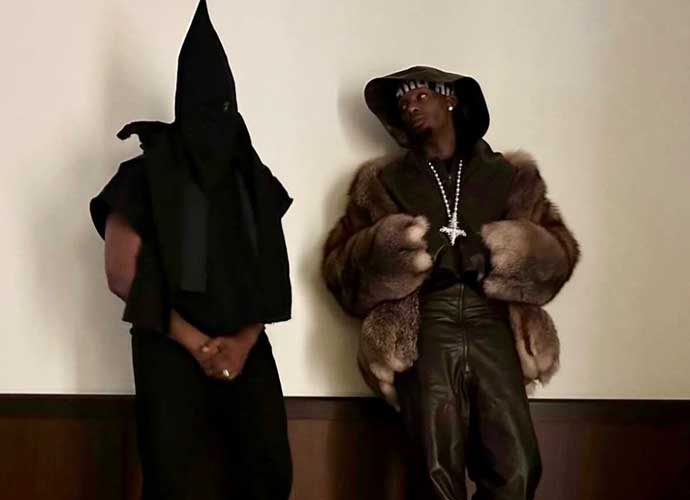 Kanye West dons KKKstyle hoodie with Playboi Carti (Image X) uInterview