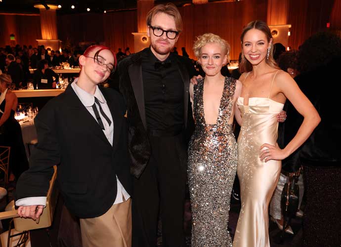 Billie Eilish, FINNEAS, Julia Garner and Claudia Sulewski at the 81st Golden Globe Awards held at the Beverly Hilton Hotel on January 7, 2024 in Beverly Hills, California. (Photo by Christopher Polk/Golden Globes 2024/Golden Globes 2024 via Getty Images)