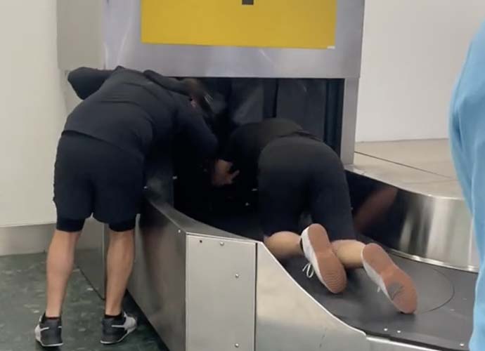 Passenger threatens to defecate on baggage carousel at Gatwick Airport (Image: TikTok)