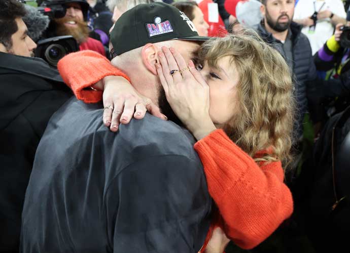 BALTIMORE, MARYLAND - JANUARY 28: Travis Kelce #87 of the Kansas City Chiefs celebrates with Taylor Swift after a 17-10 victory against the Baltimore Ravens in the AFC Championship Game at M&T Bank Stadium on January 28, 2024 in Baltimore, Maryland. (Photo by Rob Carr/Getty Images)
