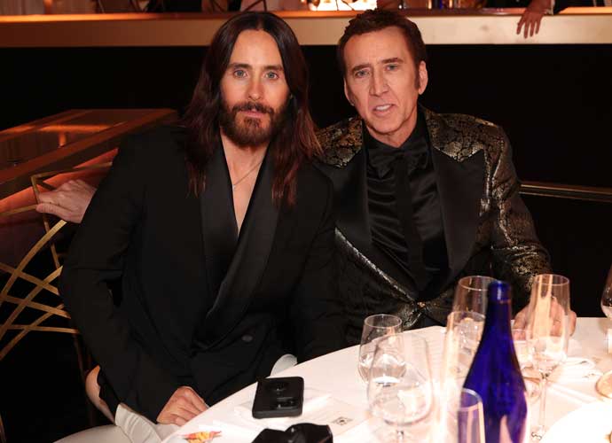 Jared Leto and Nicolas Cage at the 81st Golden Globe Awards held at the Beverly Hilton Hotel on January 7, 2024 in Beverly Hills, California. (Photo by Christopher Polk/Golden Globes 2024/Golden Globes 2024 via Getty Images)