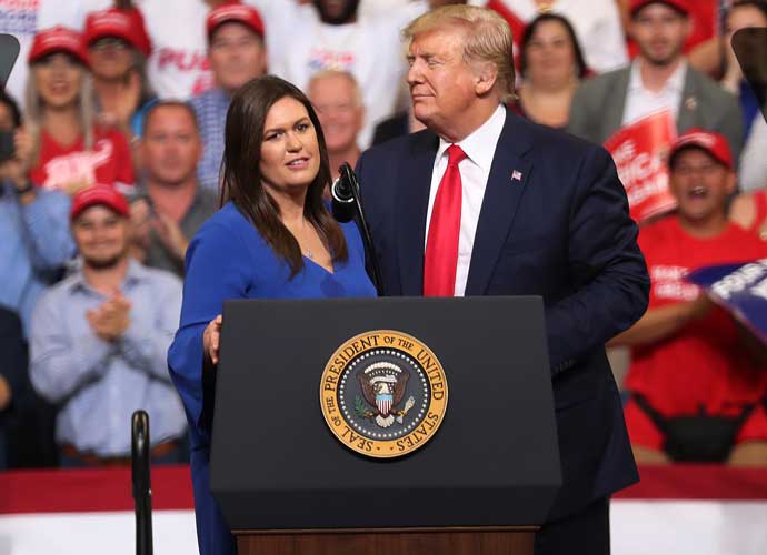 ORLANDO, FLORIDA - JUNE 18: U.S. President Donald Trump stands with Sarah Huckabee Sanders, who announced that she is stepping down as the White House press secretary, during his rally where he announced his candidacy for a second presidential term at the Amway Center on June 18, 2019 in Orlando, Florida. President Trump is set to run against a wide open Democratic field of candidates. (Photo by Joe Raedle/Getty Images)