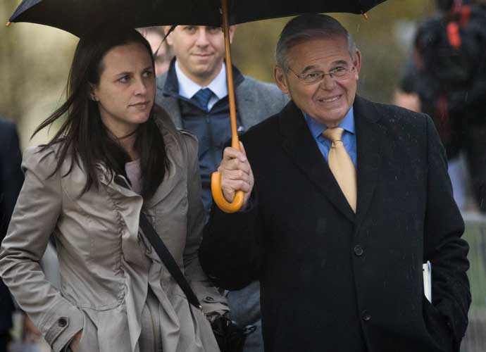 NEWARK, NJ - NOVEMBER 14: Flanked by his daughter Alicia (L) and son Robert Jr., Sen. Robert 'Bob' Menendez (D-NJ) departs federal court, November 14, 2017 in Newark, New Jersey. The jury continues to deliberate in his corruption trial. (Drew Angerer/Getty Images)