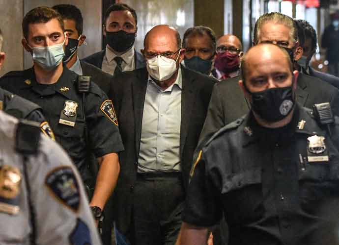 Allen Weisselberg, chief financial officer of Trump Organization Inc., center, walks towards a courtroom at criminal court in New York, U.S., on Thursday, July 1, 2021. The Trump Organization's longtime chief financial officer has surrendered to authorities in New York, facing tax-related charges in the most direct attack on Donald Trump and his business to emerge from Manhattan District Attorney Cyrus Vance Jr.'s years-long criminal probe. Photographer: Stephanie Keith/Bloomberg via Getty Images