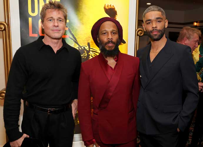 LOS ANGELES, CALIFORNIA - FEBRUARY 06: (L-R) Brad Pitt, Ziggy Marley, and Kingsley Ben-Adir attend the Los Angeles Premiere of 