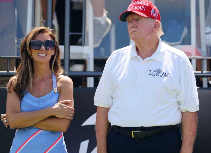 BEDMINSTER, NEW JERSEY - AUGUST 13: Former President Donald Trump and Attorney Alina Habba at the first tee during day three of the LIV Golf Invitational - Bedminster at Trump National Golf Club on August 13, 2023 in Bedminster, New Jersey. (Photo by Mike Stobe/Getty Images)