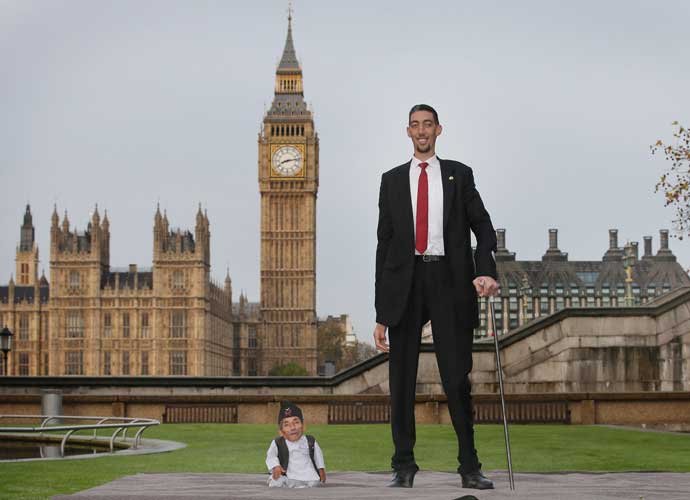 LONDON, ENGLAND - NOVEMBER 13: The shortest man ever, Chandra Bahadur Dangi meets the worlds tallest man, Sultan Kosen for the very first time on November 13, 2014 in London, England. Chandra from Nepal measuring 54.6 cm (21.5 inches) posed for photographers with Sultan from Turkey who is 251 cm (8 ft 3 inches). Today is the 10th annual Guinness World Records Day during which thousands of people are expected to come together to celebrate the international day of record-breaking! (Photo by Peter Macdiarmid/Getty Images)