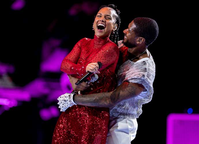 LAS VEGAS, NEVADA - FEBRUARY 11: Usher performs with Alicia Keys during the Apple Music halftime show at the NFL Super Bowl 58 football game between the San Francisco 49ers and the Kansas City Chiefs at Allegiant Stadium on February 11, 2024 in Las Vegas, Nevada. (Photo by Michael Owens/Getty Images)