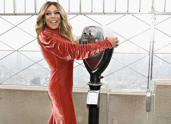 NEW YORK, NY - SEPTEMBER 18: Wendy Williams poses for a photo on the observation deck after taking part in the ceremonial lighting of the Empire State Building to celebrate the ninth season of 