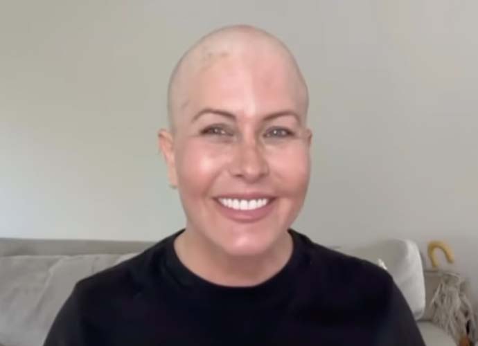 Nicole Eggert shows off her shaved head (Image: Instagram)