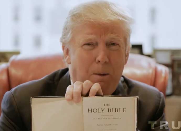 Donald Trump holds up a Bible in campaign ad (Image: Trump Campaign)