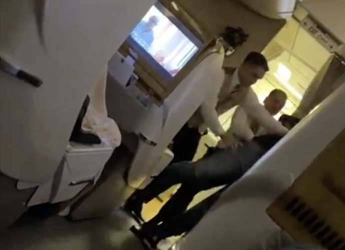 Unruly Emirates passenger hogtied (Image: X)