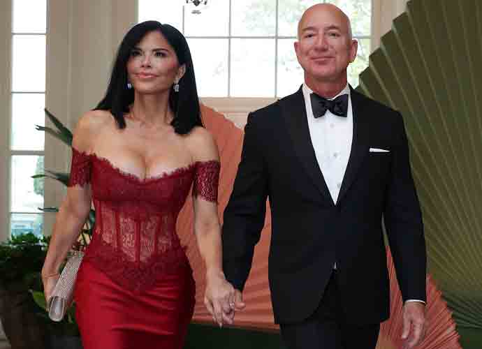 WASHINGTON, DC - APRIL 10: Amazon founder Jeff Bezos (R) and his fiancee Lauren Sanchez arrive at the White House for a state dinner on April 10, 2024 in Washington, DC. U.S. President Joe Biden and first lady Jill Biden are hosting a state dinner for Japanese Prime Minister Fumio Kishida as part of his official state visit. (Photo by Tasos Katopodis/Getty Images)