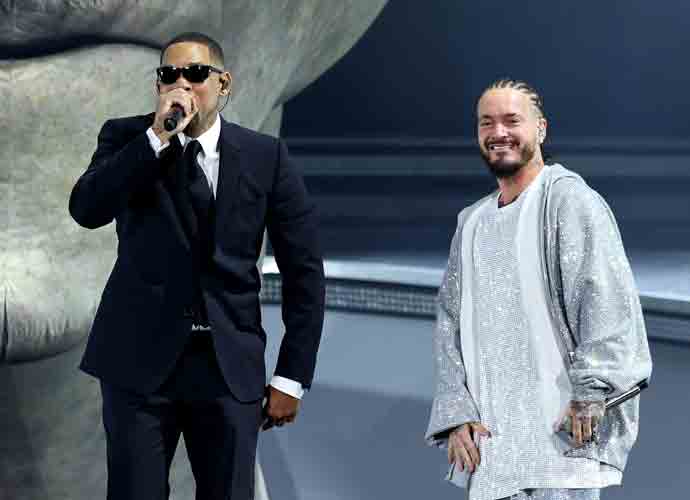INDIO, CALIFORNIA - APRIL 14: (L-R) Will Smith and J Balvin perform at the Coachella Stage during the 2024 Coachella Valley Music and Arts Festival at Empire Polo Club on April 14, 2024 in Indio, California. (Photo by Arturo Holmes/Getty Images for Coachella)