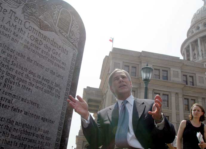AUSTIN, TX - JUNE 27: Texas Attorney General Greg Abbott attends a press conference celebrating the U.S. Supreme Court decision that allows a Ten Commandments monument to stand outside the Texas State Capitol June 27, 2005 in Austin, Texas. A sharply divided Supreme Court upheld the constitutionality of displaying the Ten Commandments on government land, but drew the line on displays inside courthouses, saying they violated the doctrine of separation of church and state. (Photo by Jana Birchum/Getty Images)