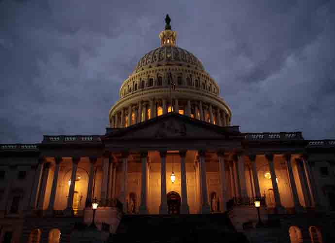 WASHINGTON, DC - JANUARY 21: The U.S. Capitol is seen at dusk, January 21, 2018 in Washington, DC. Lawmakers are convening for a Sunday session to try to resolve the government shutdown. (Photo by Drew Angerer/Getty Images)